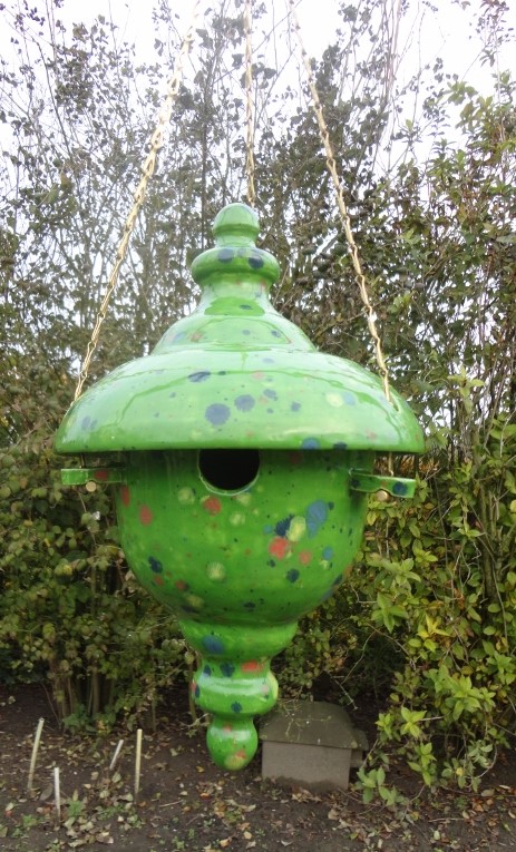Vogelhuis groen rond deksel